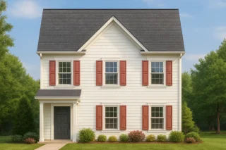Front elevation of a traditional Colonial-style home featuring white horizontal siding, symmetrical windows, and red shutters for timeless curb appeal