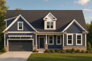 Front view of a Modern Farmhouse with dark blue siding, white trim, board and batten accents, and a stone base foundation beneath a steep gable roof