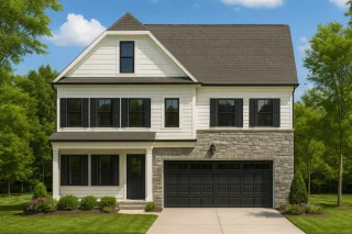 Front view of a Modern Farmhouse style two-story home featuring board and batten siding with stone accents, black window trim, and a two-car garage