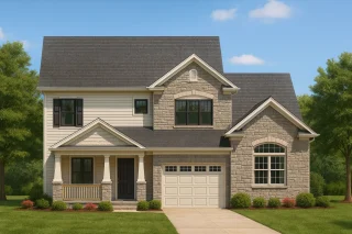 Front elevation of a Traditional Colonial style home featuring a stone and horizontal siding exterior, gable rooflines, and welcoming front porch entry